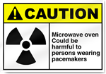 Microwave Oven Could Be Harmful To Persons Wearing Pacemakers Caution Signs