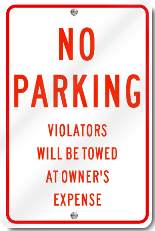 No Parking Violators Will Be Towed Sign in Red